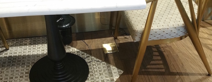 Power supply under the chair